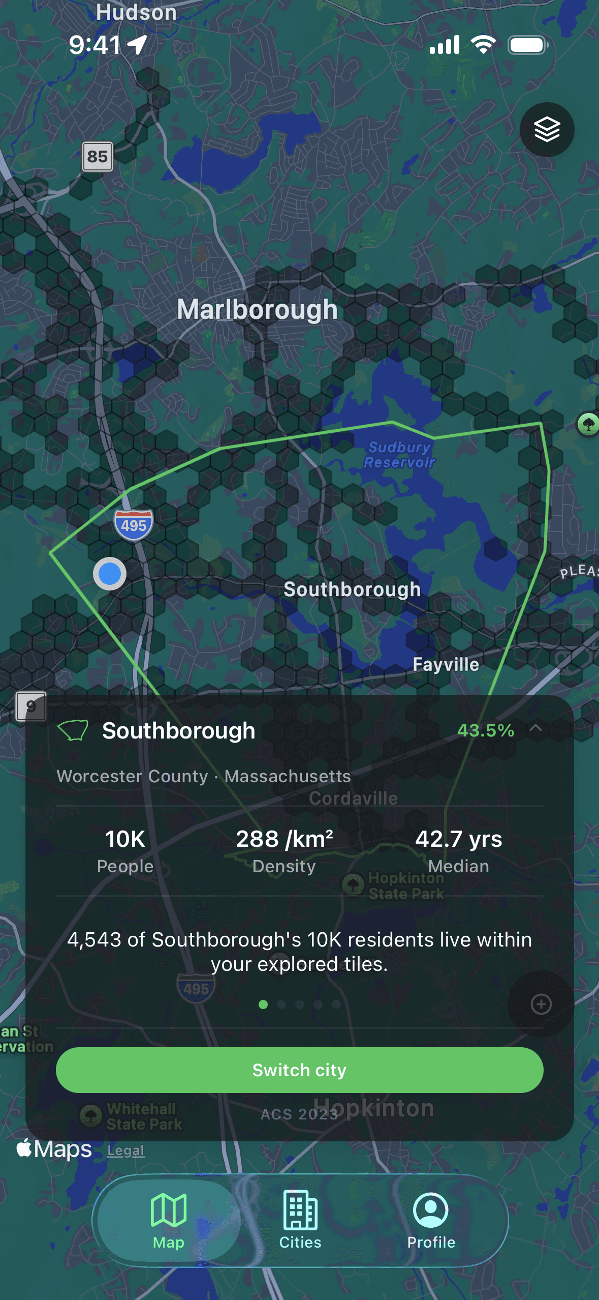 A city card in Explored showing a town's population, density, and how many residents live within your explored tiles.